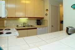 Upgraded kitchen, filtered drinking water, tiled filoor, counter top, backsplash, and new appliances